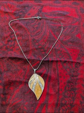 Elegant Leaf Pendant Necklace with Honey Amber Inlay